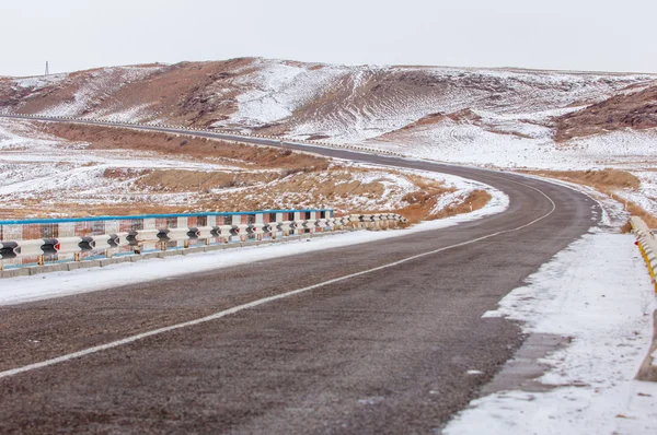 Winter road in the desert — Stock Photo, Image