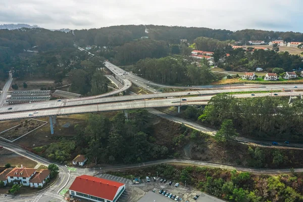 Aerial view of highway interchange, of a city