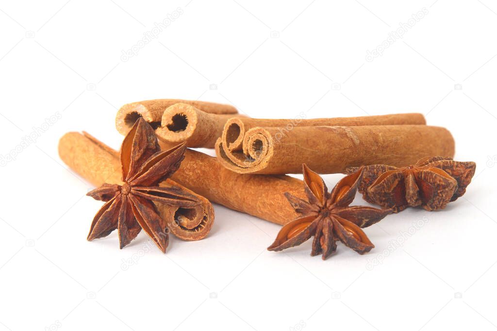 spices as cinnamon stick and anise star isolated on white background