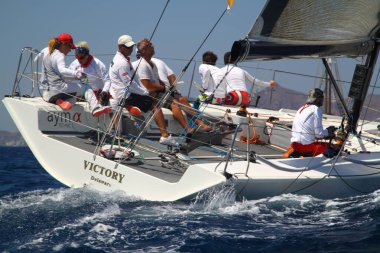 Bodrum,Turkey. 19 August 2016: The sailing races have been performed by the organization of Turkey Sailling Federation in Bodrum for the memory of Mustafa Koc. clipart