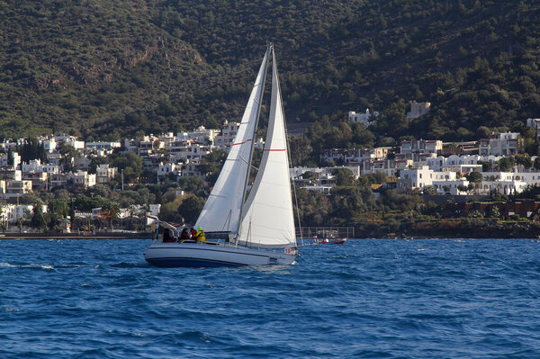 Bodrum,Turkey.11 February 2018: Sailboats sail in windy weather in the blue waters of the Aegean Sea, on the shores of the famous holiday destination Bodrum.