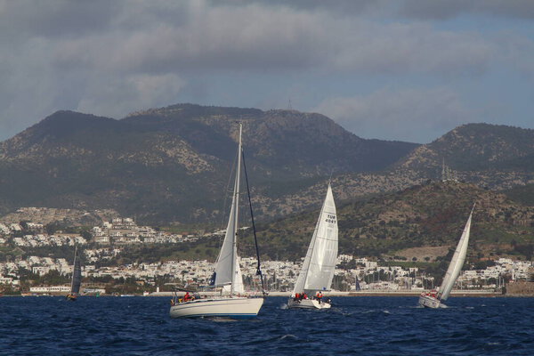 Bodrum,Turkey.11 February 2018: Sailboats sail in windy weather in the blue waters of the Aegean Sea, on the shores of the famous holiday destination Bodrum.