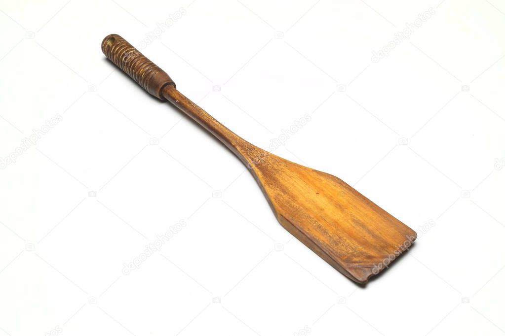 Old wood spatula for cooking on white background