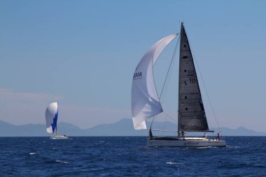 Bodrum,Turkey. 24 May 2019: Sailboats sail in windy weather in the blue waters of the Aegean Sea, on the shores of the famous holiday destination Bodrum.