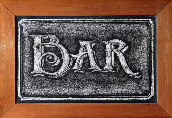 Bar sign on blackboard