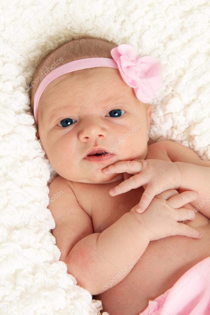 Newborn baby girl with eyes open stock photo Newborn baby girl with eyes open stock photo