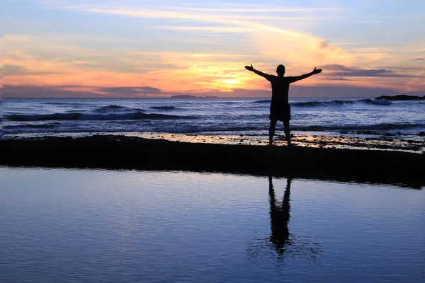 Man with outstretched arms — Stock Photo, Image