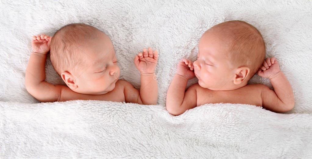Sleeping newborn twins