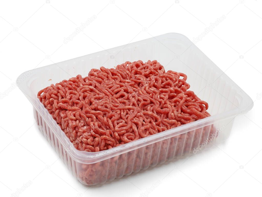 raw fresh beef minced meat in plastic container on white background