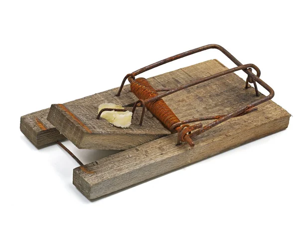 Old rusty mousetrap with cheese bait isolated on white background — Stockfoto