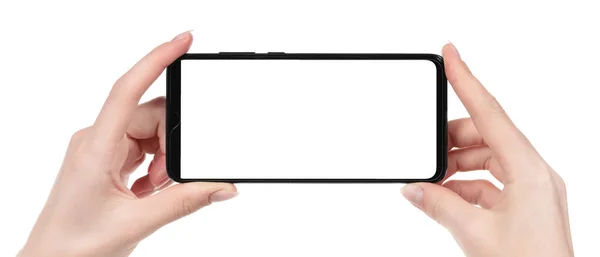 Жінка Тримає Чорний Новий Смартфон Порожнім Екраном Ізольованим Білим Тлом — стокове фото