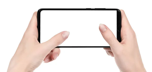 Kobieta Trzyma Czarny Nowy Smartfon Pustym Ekranem Odizolowane Białe Tło — Zdjęcie stockowe