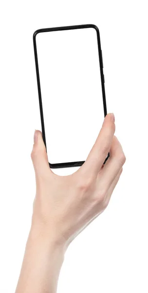 空白の画面で黒の新しいスマートフォンを保持女性の手は白い背景を隔離しました 携帯電話のクリッピングパスを使って — ストック写真