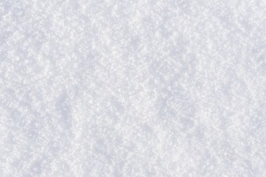 Beyaz, parlak, kar arkaplan dokusu. Taze, dikişsiz kar dokusu. Karlı yüzey kapanışı