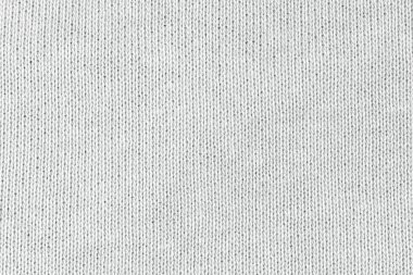 Örgü yün kumaş arka planının beyaz doğal dokusu. Beyaz pamuk kumaş, örülmüş tuval dokusu