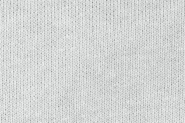 Örgü yün kumaş arka planının beyaz doğal dokusu. Beyaz pamuk kumaş, örülmüş tuval dokusu