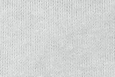 Örgü yün kumaş arka planının beyaz doğal dokusu. Beyaz pamuk kumaş, örülmüş tuval dokusu
