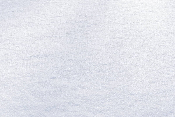 White clean shiny snow background texture. fresh snow  seamless texture. snowy surface closeup