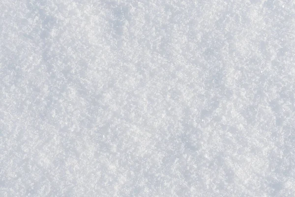 白いきれいな光沢のある雪の背景のテクスチャ 新雪のシームレスな質感 雪の表面が閉じて — ストック写真