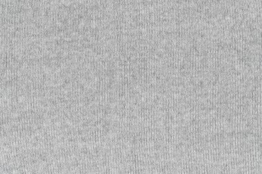 Örgü yün kumaş arka planının gri doğal dokusu. Gri örgü, pamuk kumaş, dokuma bezi dokusu. Kapat.