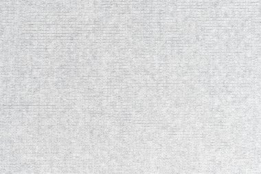 Örgü yün kumaş arka planının beyaz doğal dokusu. Beyaz örgü, pamuk kumaş, dokuma bezi dokusu. Kapat.