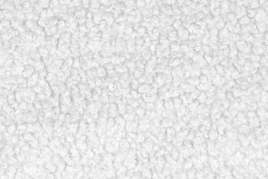 Örgü yün kumaş arka planının beyaz doğal dokusu. Beyaz örgü, pamuk kumaş, dokuma bezi dokusu. Kapat.