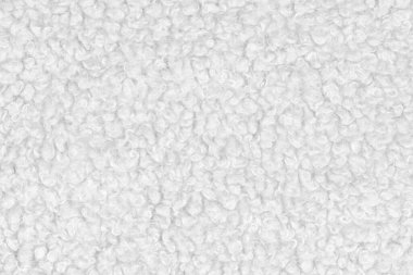 Örgü yün kumaş arka planının beyaz doğal dokusu. Beyaz örgü, pamuk kumaş, dokuma bezi dokusu. Kapat.