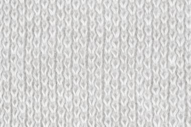 Örgü yün kumaş arka planının beyaz doğal dokusu. Beyaz örgü, pamuk kumaş, dokuma bezi dokusu. Kapat.