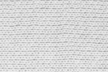 Örgü yün kumaş arka planının beyaz doğal dokusu. Beyaz örgü, pamuk kumaş, dokuma bezi dokusu. Kapat.