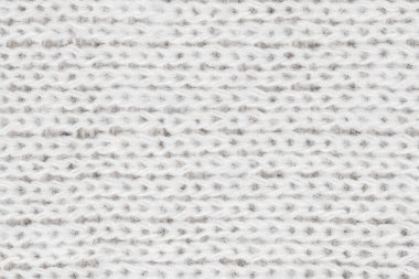 Örgü yün kumaş arka planının beyaz doğal dokusu. Beyaz örgü, pamuk kumaş, dokuma bezi dokusu. Kapat.