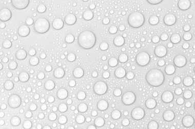 Beyaz arkaplan dokusuna su damlaları. Arkaplan camı su damlalarıyla kaplı. Sudaki kabarcıklar