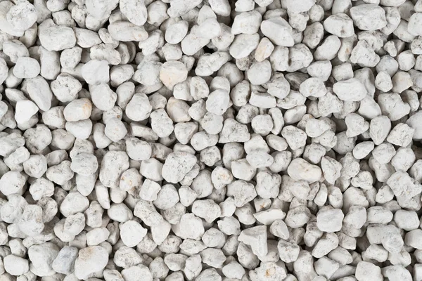 White pebbles background texture. Rock background. clay pebbles