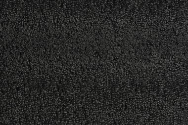 Siyah köpük plastik arka plan dokusu. Tasarımcılar için siyah arkaplan. koyu renk köpük.