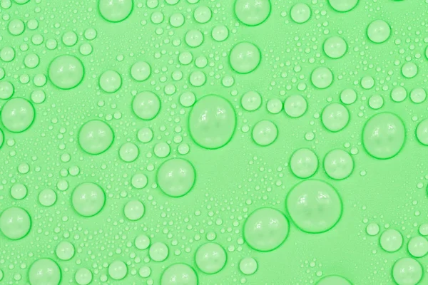 Waterdruppels Groene Achtergrond Textuur Achtergrondglas Bedekt Met Druppels Water Groene — Stockfoto