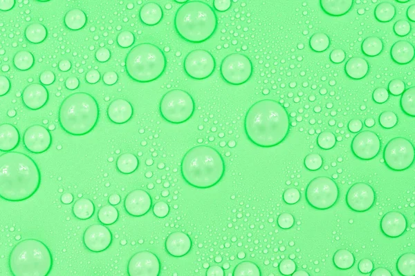 Waterdruppels Groene Achtergrond Textuur Achtergrondglas Bedekt Met Druppels Water Groene — Stockfoto