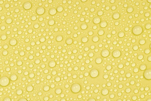 Water Drops Yellow Background Texture Backdrop Glass Covered Drops Water — Stock Photo, Image