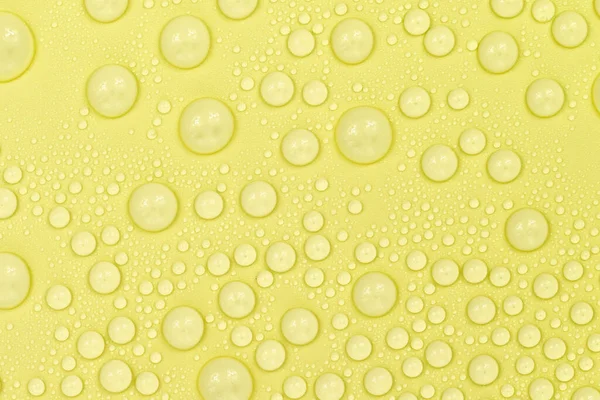 Voda Kapky Žluté Pozadí Textury Backdrop Sklo Pokryté Kapkami Vody — Stock fotografie