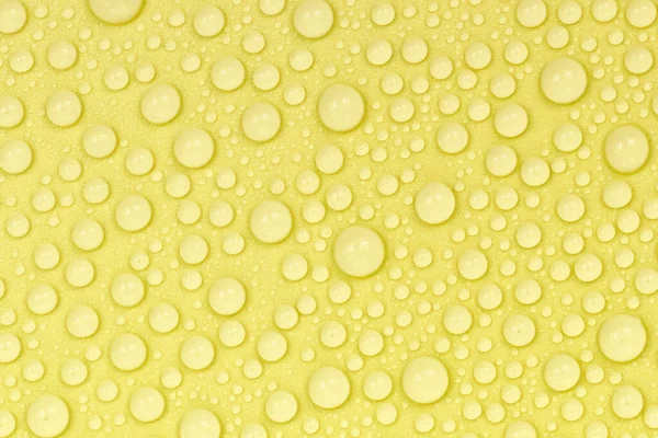 Wassertropfen Auf Gelbem Hintergrund Hintergrundglas Das Mit Wassertropfen Bedeckt Ist — Stockfoto