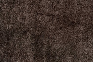 Yün ve yün arkaplan dokusuyla kahverengi fabrika malzemesi. Kürk desenli. kanepe dokusu