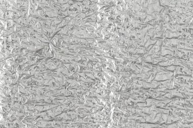 Gümüş folyonun kusursuz arka plan dokusu. Parlak beyaz bir yüzey. yansıtıcı