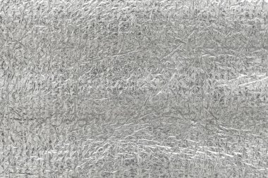 Gümüş folyonun kusursuz arka plan dokusu. Parlak beyaz bir yüzey. yansıtıcı