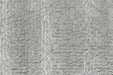 Gümüş folyonun kusursuz arka plan dokusu. Parlak beyaz bir yüzey. yansıtıcı