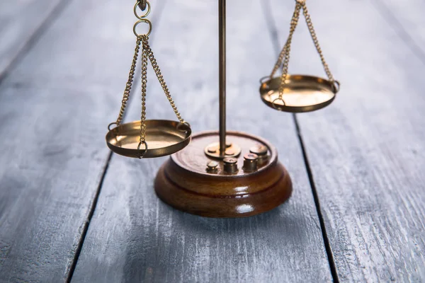 Law scales on table background. Symbol of justic