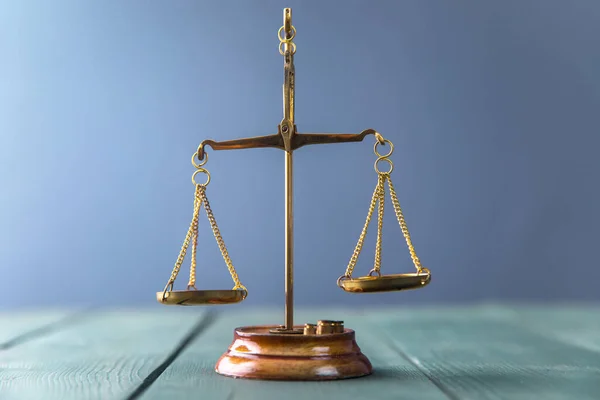 Law scales on table background. Symbol of justic