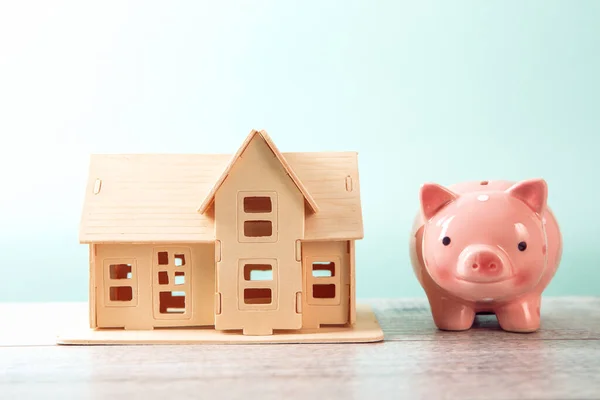 real estate, piggy bank with house mode