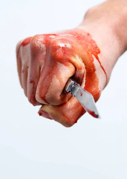 Bloody stabbing. Hand with knife (knife, horror, blood)