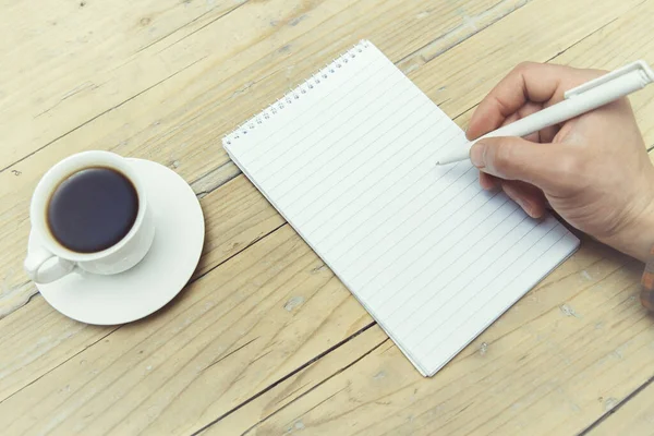 Escribiendo Mano Taza Café Sobre Fondo Madera Mesa —  Fotos de Stock