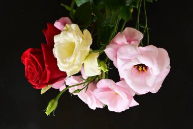 bouquet of rose and eustoma flowers, close - up 