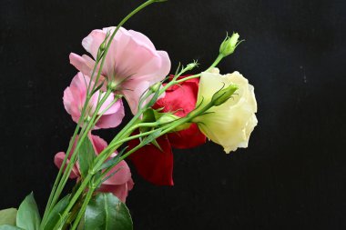 bouquet of rose and eustoma flowers, close - up 