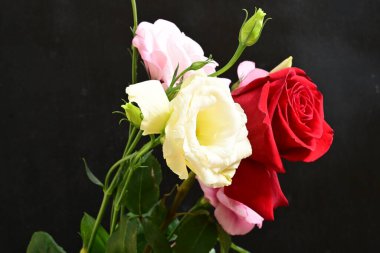 bouquet of rose and eustoma flowers, close - up 